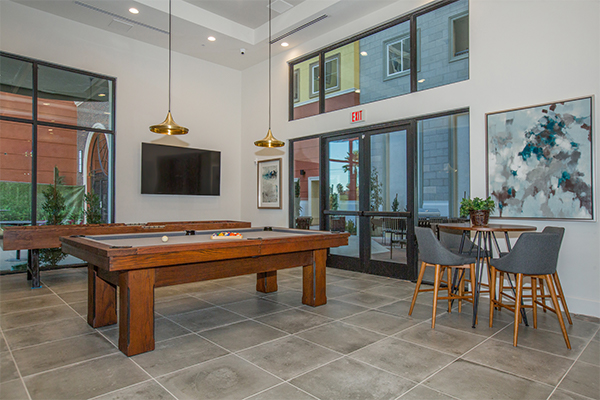 picture of a person using their phone to apply